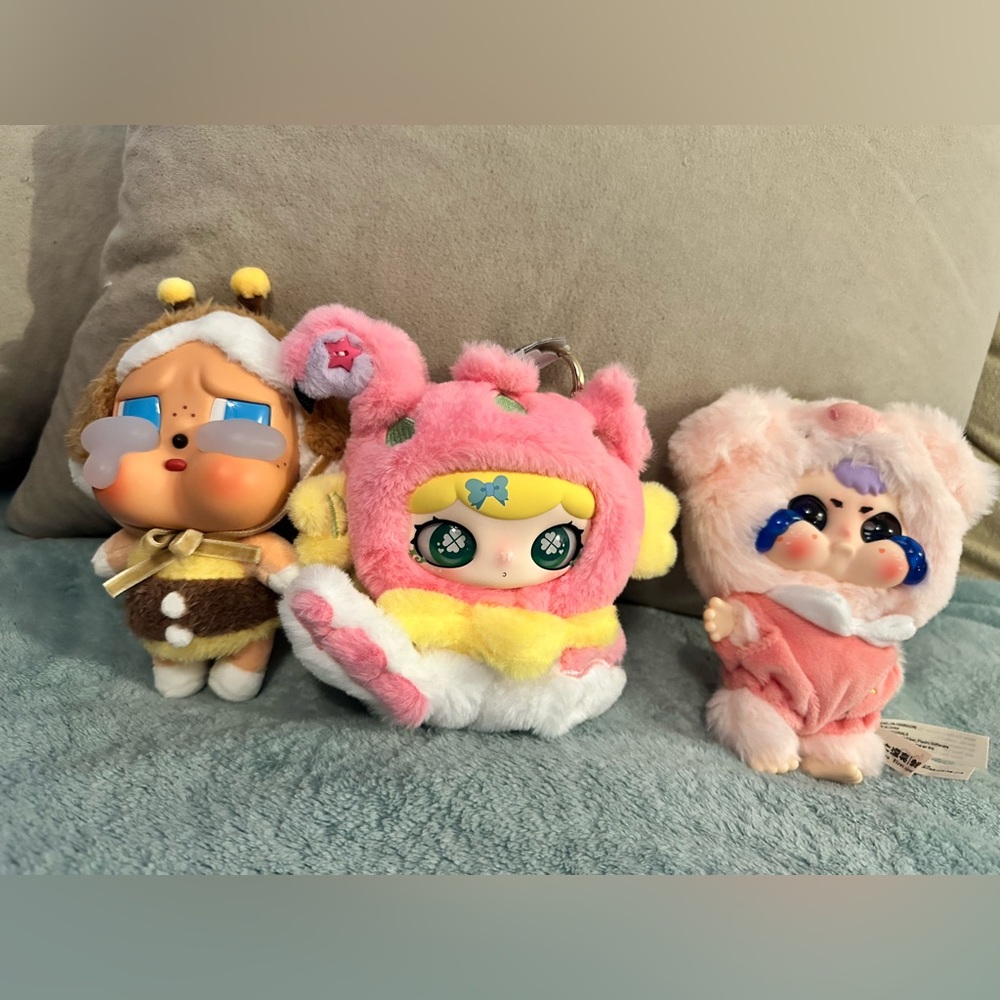 Set of three keychain plushies